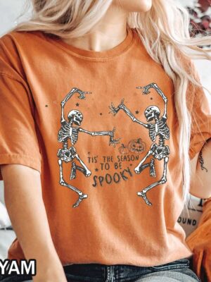 Halloween Dancing Skeletons Comfort Colors T-Shirt Featuring Two Dancing Skeletons