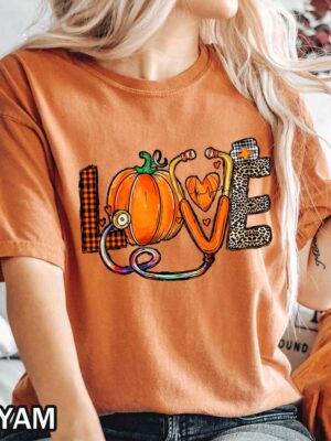 Thanksgiving Nurse "Love" T-Shirt Thanksgiving Nurse "Love" T-Shirt with Buffalo Plaid, Pumpkin, Heart, and Leopard Prints