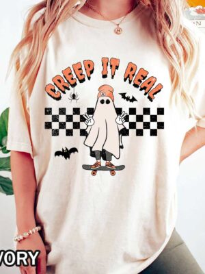 Creep It Real T-Shirt Vintage Halloween T-Shirt with Skateboard Ghost Design