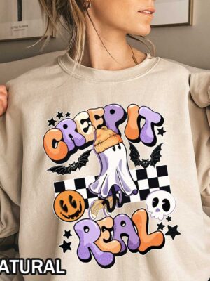 Halloween Creep It Real Sweatshirt - Cute Ghost with Orange Beanie Vintage playful Halloween Creep It Real Sweatshirt featuring a cute ghost in an orange beanie