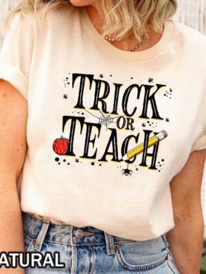 Halloween Trick or Teach T-Shirt for Teachers Halloween Trick or Teach T-Shirt featuring a spooky teacher design