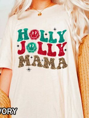 Christmas Holly Jolly Mama Comfort Colors T-Shirt and Sweatshirt Image Christmas Holly Jolly Mama Comfort Colors T-Shirt Featuring Smiley Face