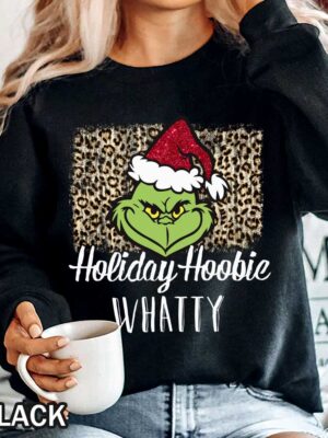 Grinch Christmas Sweatshirt That Says 'Holiday Hoobie Whatty' Grinch Christmas Sweatshirt That Says 'Holiday Hoobie Whatty'