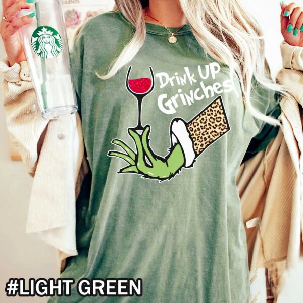 Light Green Comfort Colors Grinch Wine Shirt That Says Drink Up Grinches Drink Up Grinches! Leopard Grinch Wine Christmas Shirt